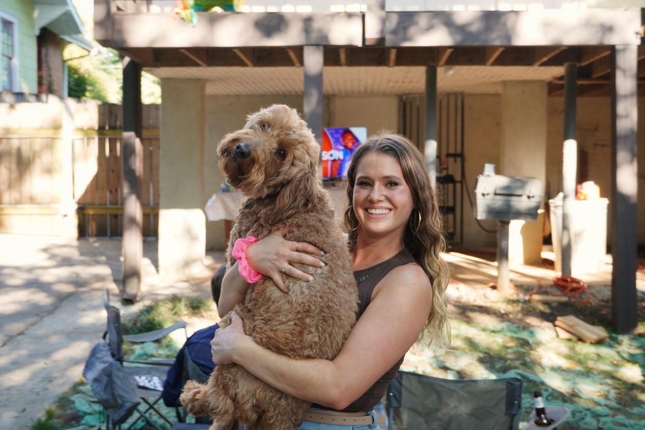 Remi does not like being picked up. We'll tolerate it for Lauren though.