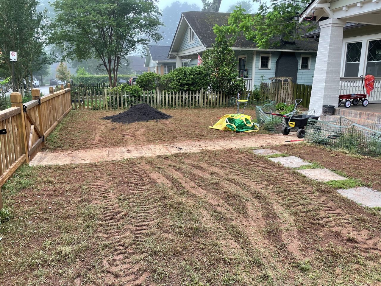 Bag of compost dumped in the yard