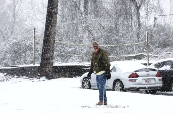 Someone walks through the snow.