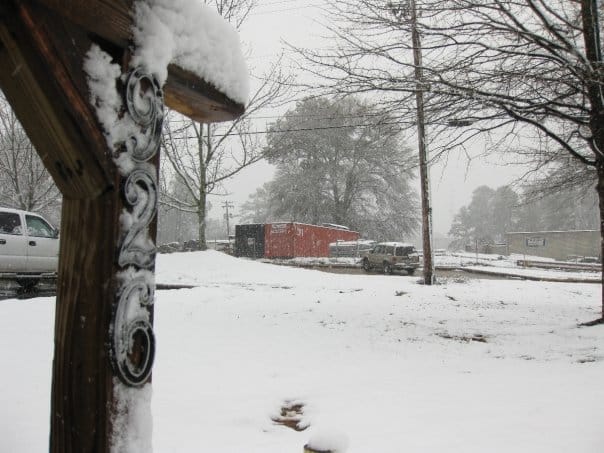 A mailbox with 926 covered in snow.