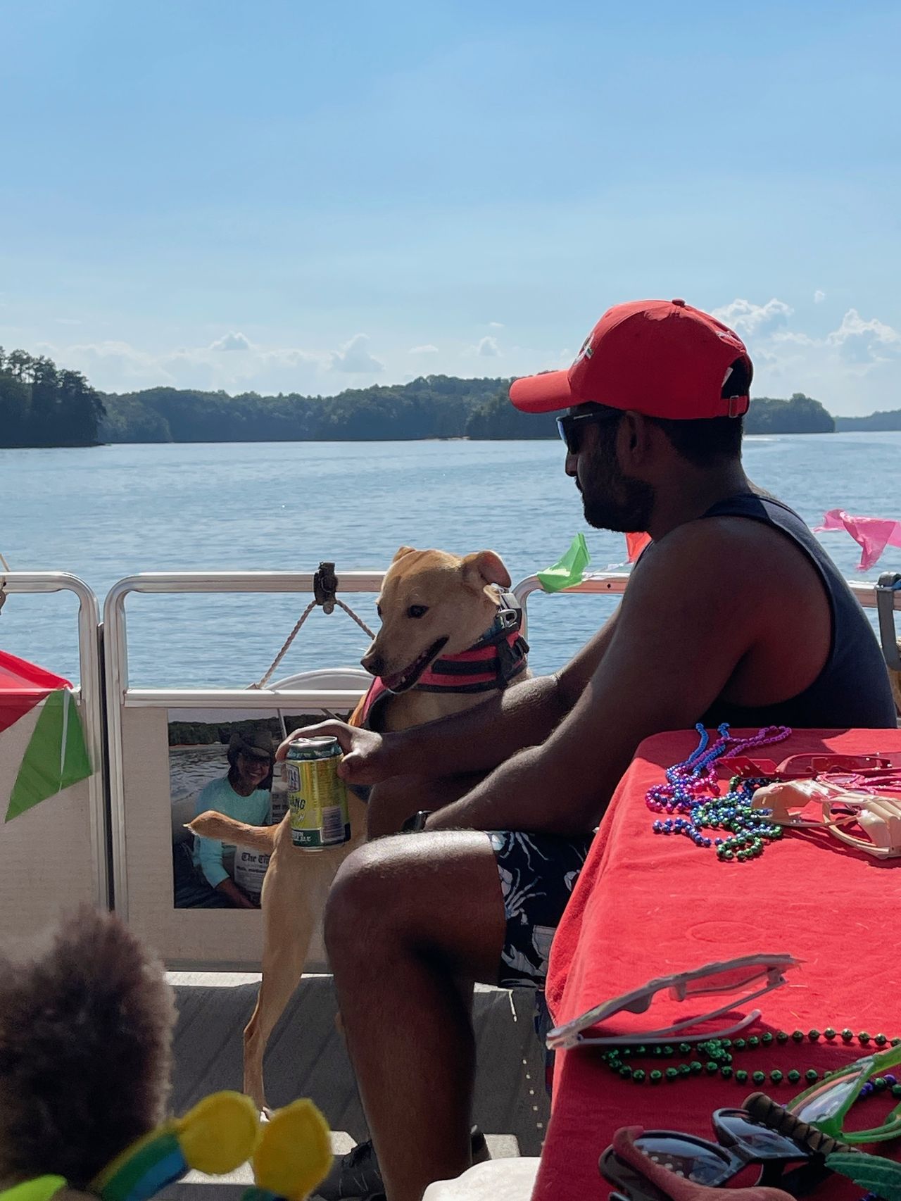 Shot of Andy and Luna at the front of the boat.
