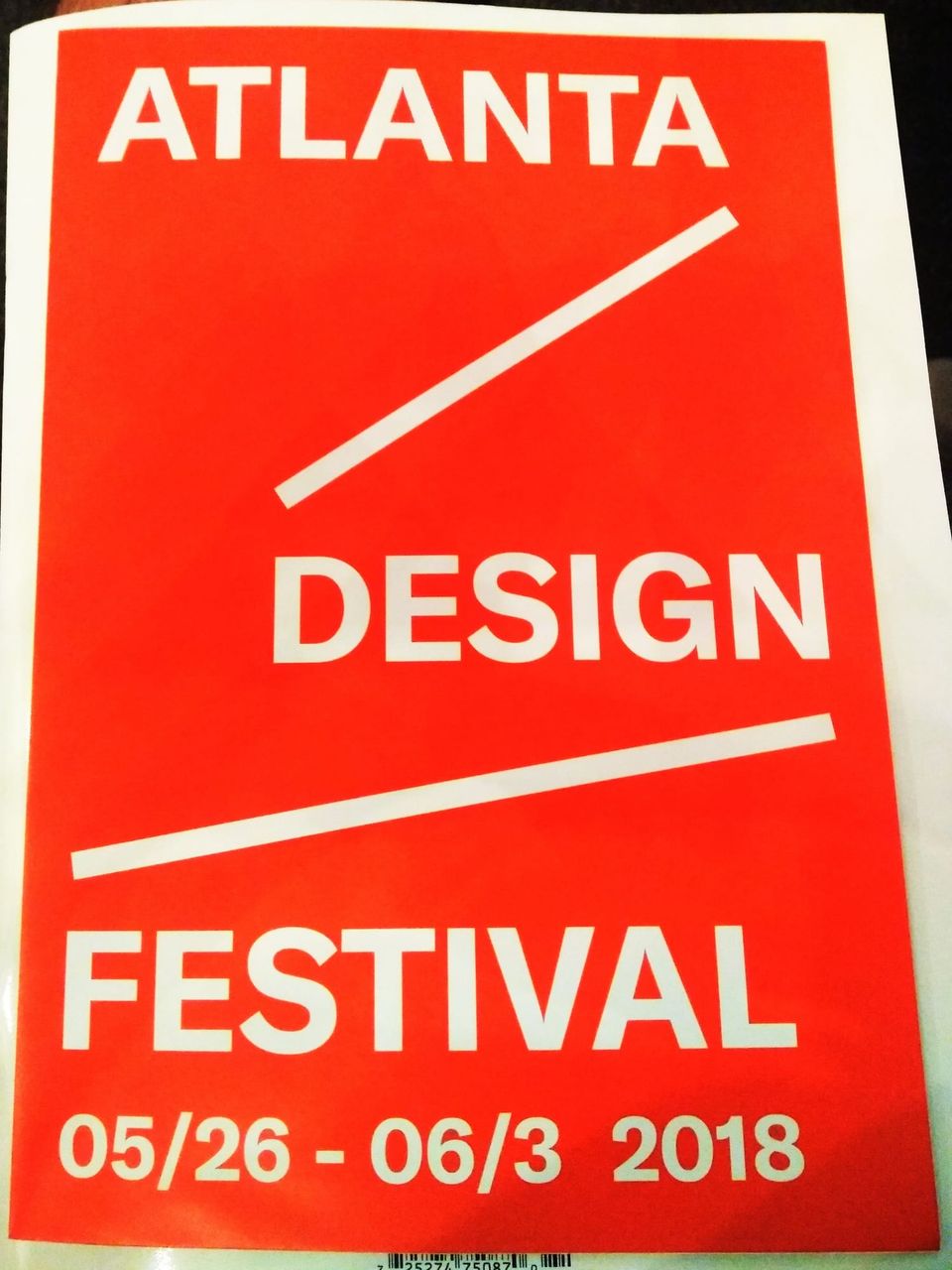 Red Atlanta Design Festival program cover with white type and slashes, dated 05/26 - 06/3 2018