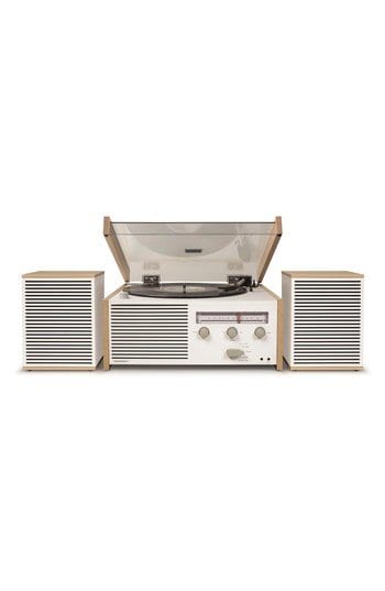 Cream and wood Crosley turntable with a radio dial and knobs flanked by two slatted speakers