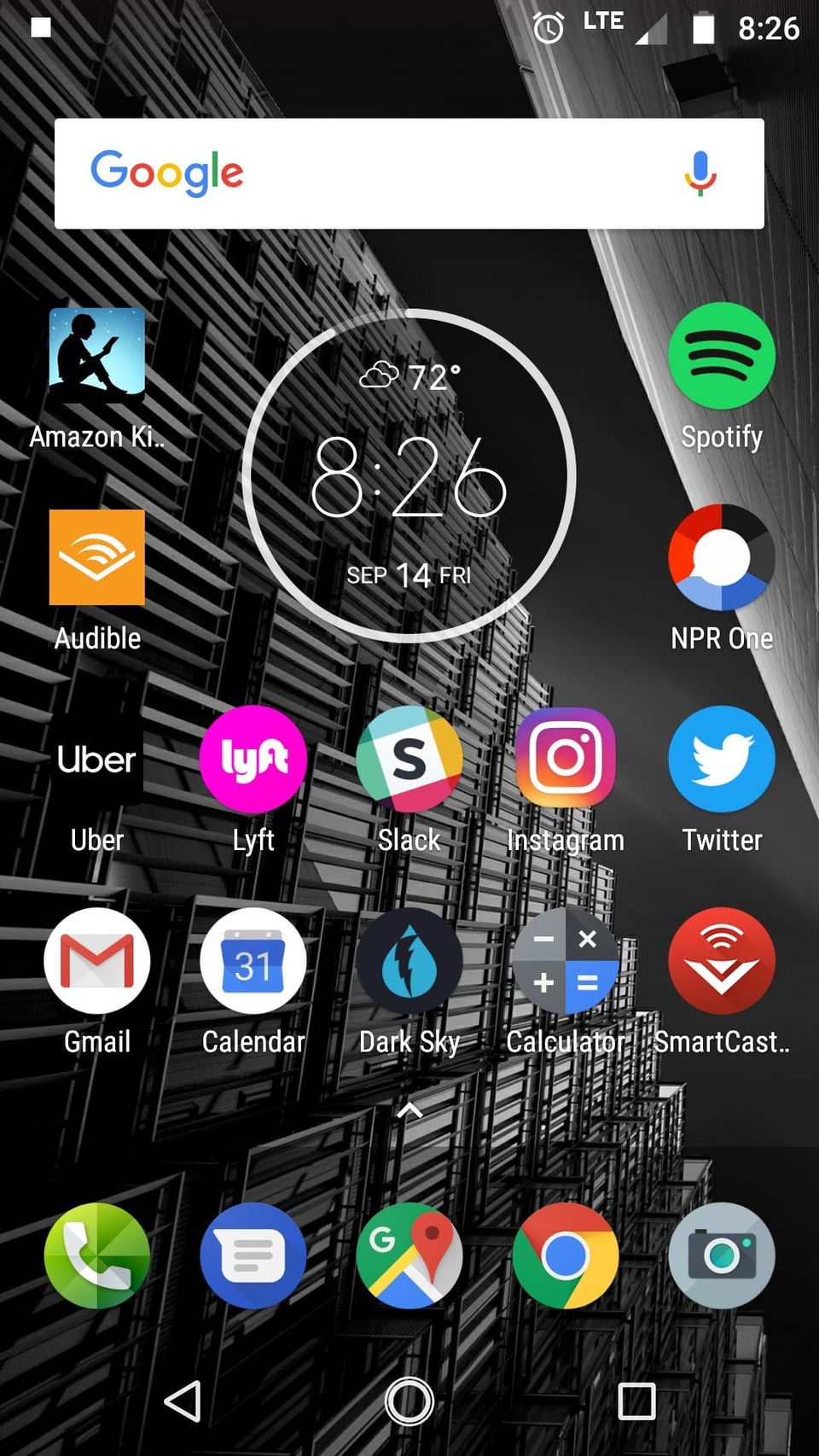 Android home screen with the new black Uber wordmark app icon among Lyft, Slack and Instagram