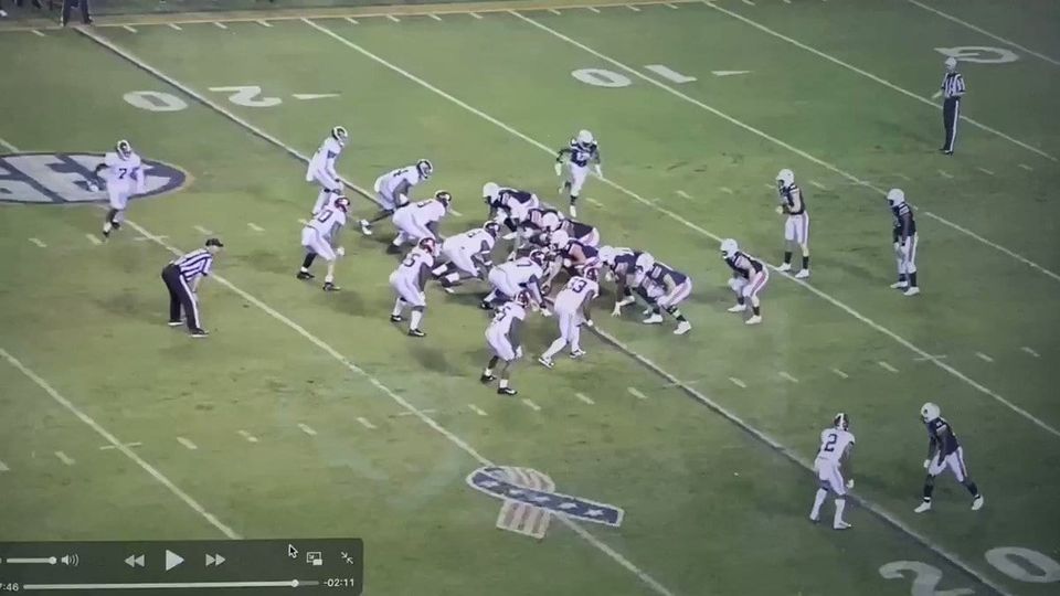 Broadcast still of Auburn and Alabama lined up at the line of scrimmage in the 2019 Iron Bowl