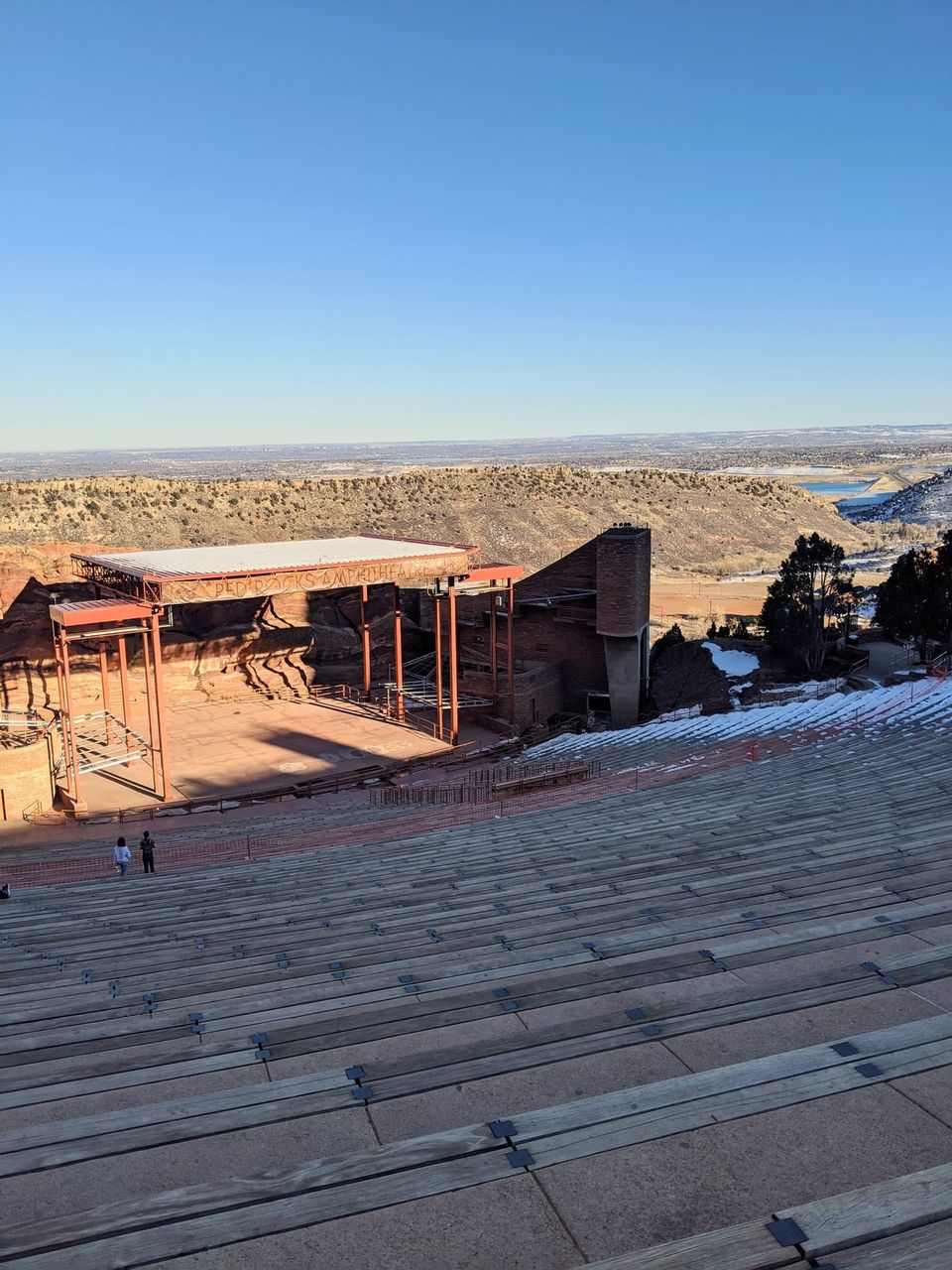 Red Rocks Amphitheatre stage seen from the upper rows with the plains stretching to the horizon