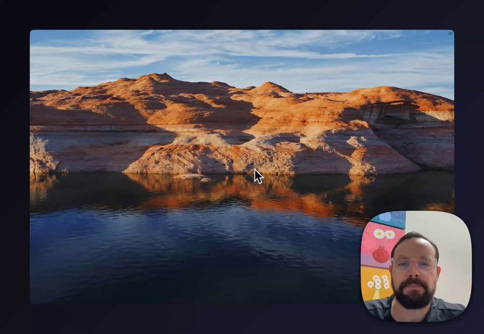 Sam on webcam over a screen recording of a desktop with a sunlit sandstone canyon and lake