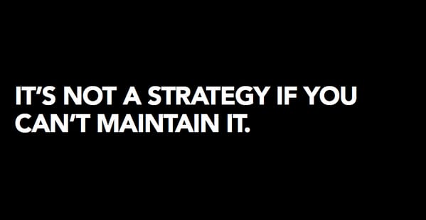 Slide reading "IT'S NOT A STRATEGY IF YOU CAN'T MAINTAIN IT" in white on black