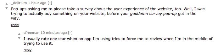 Hacker News comments complaining about survey pop-ups and giving one star to apps that interrupt with review prompts