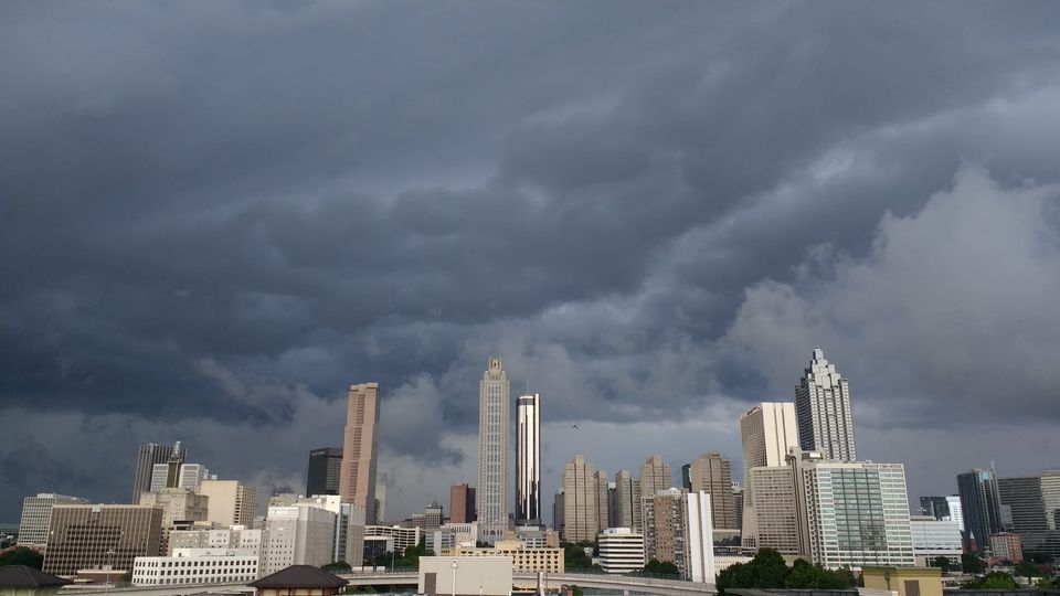 Heavy dark storm clouds over the downtown Atlanta skyline