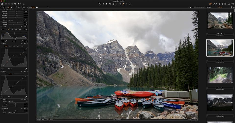 Capture One Pro editing a photo of canoes at Moraine Lake beneath rocky mountains with curves and levels panels