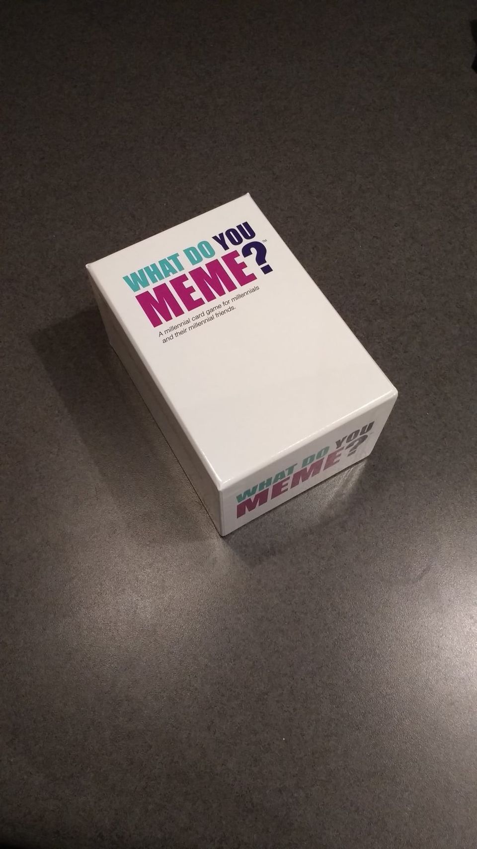 White What Do You Meme? card game box billed as a millennial card game for millennials and their millennial friends