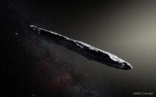 Artist's concept of the long cigar-shaped interstellar object 'Oumuamua against a starfield