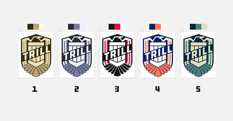 Five shield-shaped Trill badges with eagle motifs in different color palettes, numbered 1 to 5