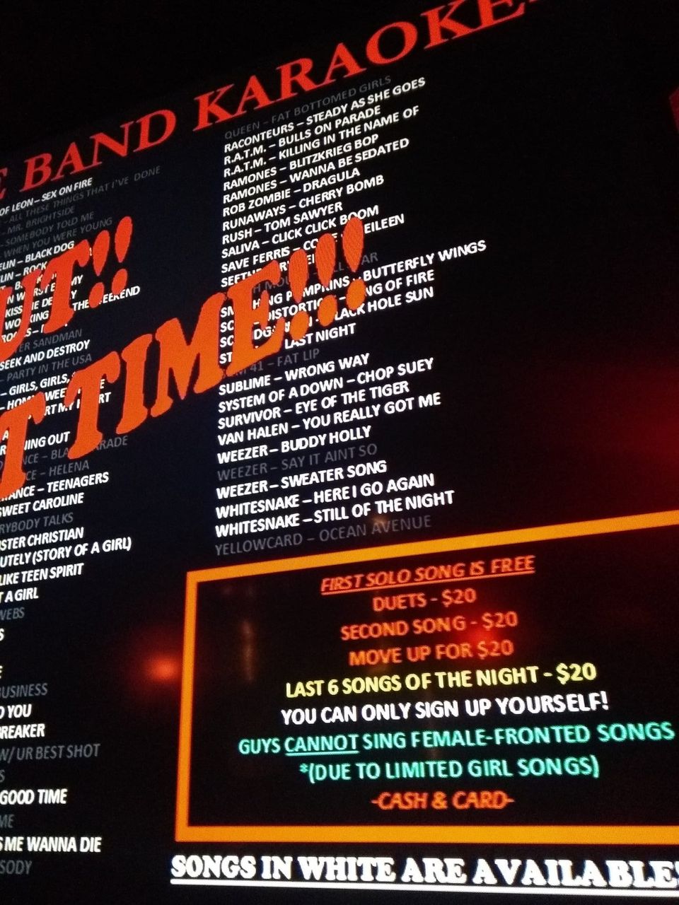 Karaoke list from Queen to Yellowcard above rules like first solo song free and duets for $20